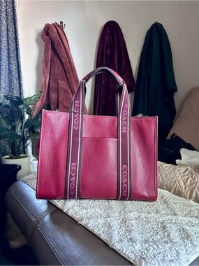 COACH Red Smith Tote with crossbody strap.